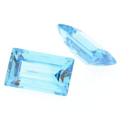 Zirk. blau topas baguette step cut 7 x 3 mm